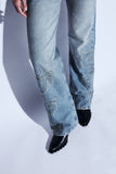 Calça Jeans Tachas