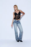Calça Jeans Tachas